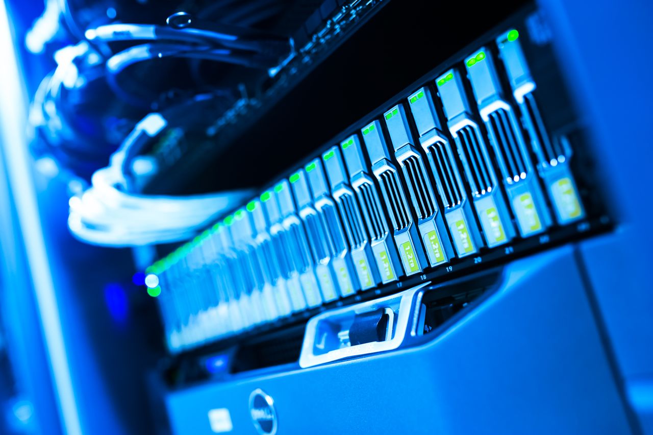 Mastering the First Impression: Your intriguing post title goes here A detailed view of a blue lit computer server rack in a data center showcasing technology and hardware.